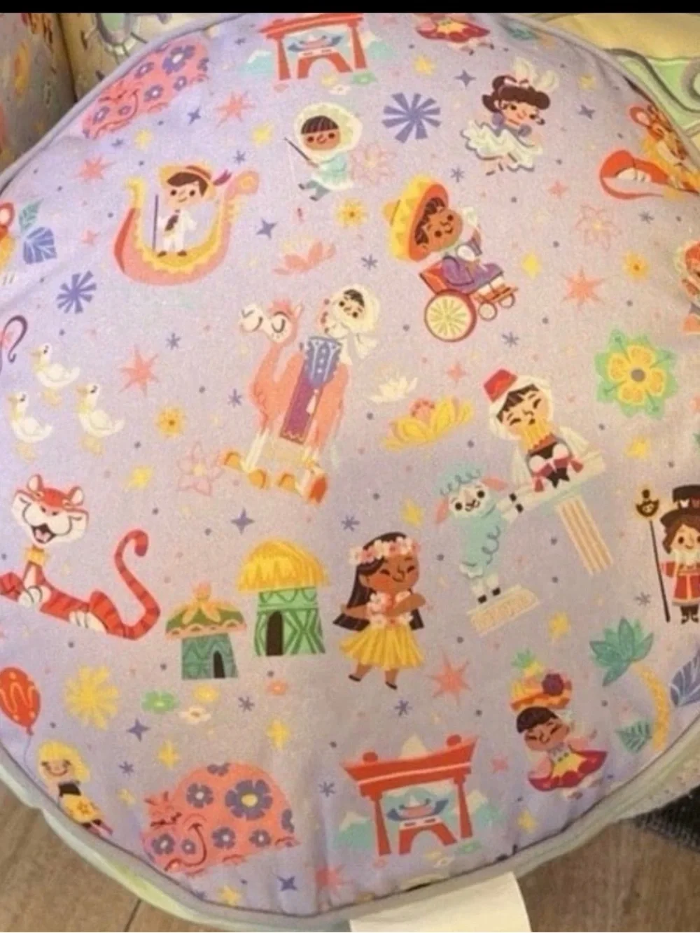 Disney Small World decorative Round Embroidered Accent Pillow.
